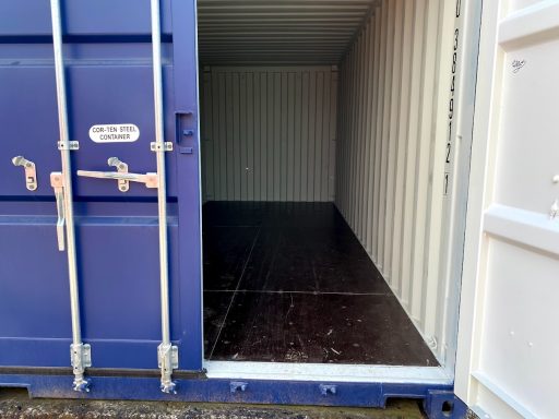 blue one trip storage shipping container with door open