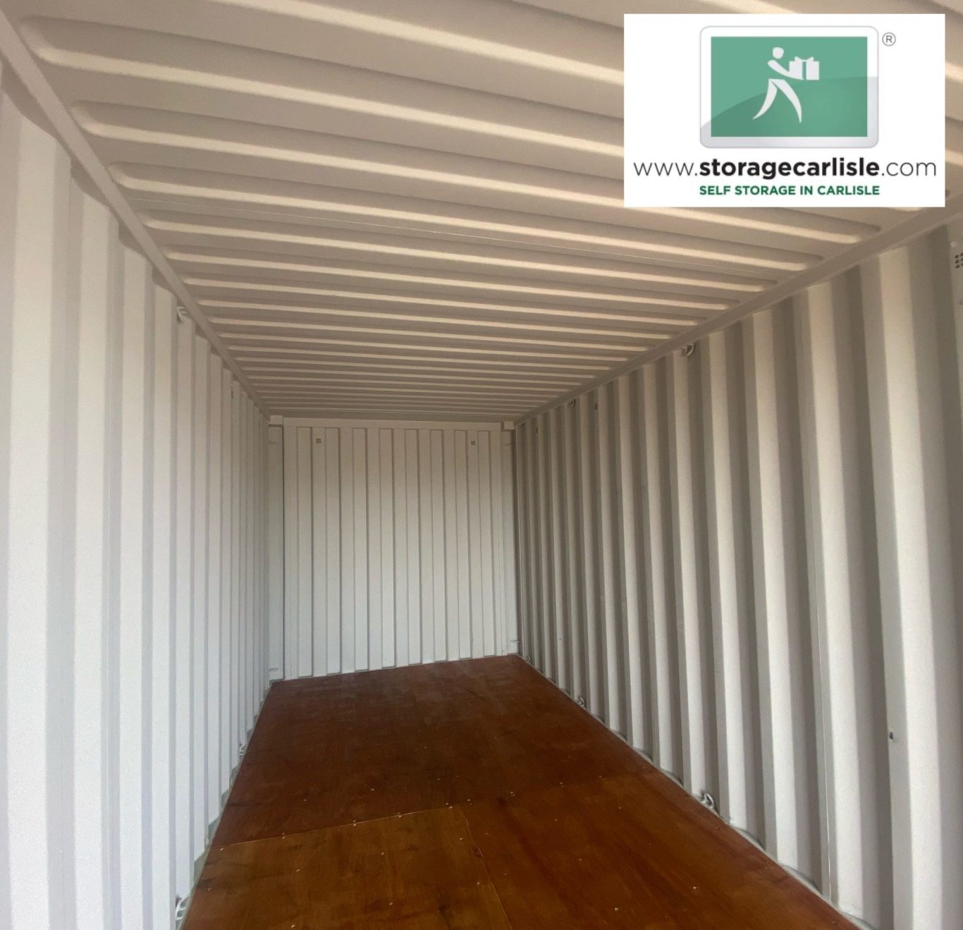 interior of a self storage unit showing floor and sides