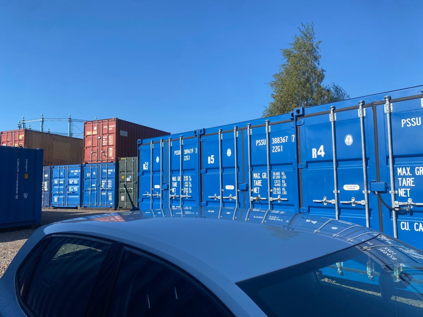 A self storage facility with car parked on site