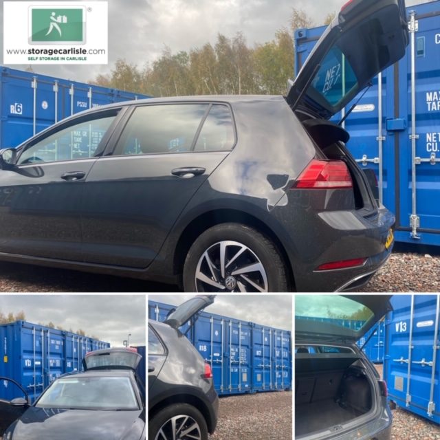 motor cars with boot lid open about to unload contents into storage