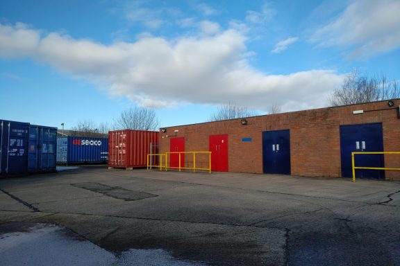 a storage yard with buildings