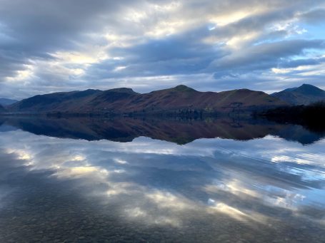 mountains reflecting in water