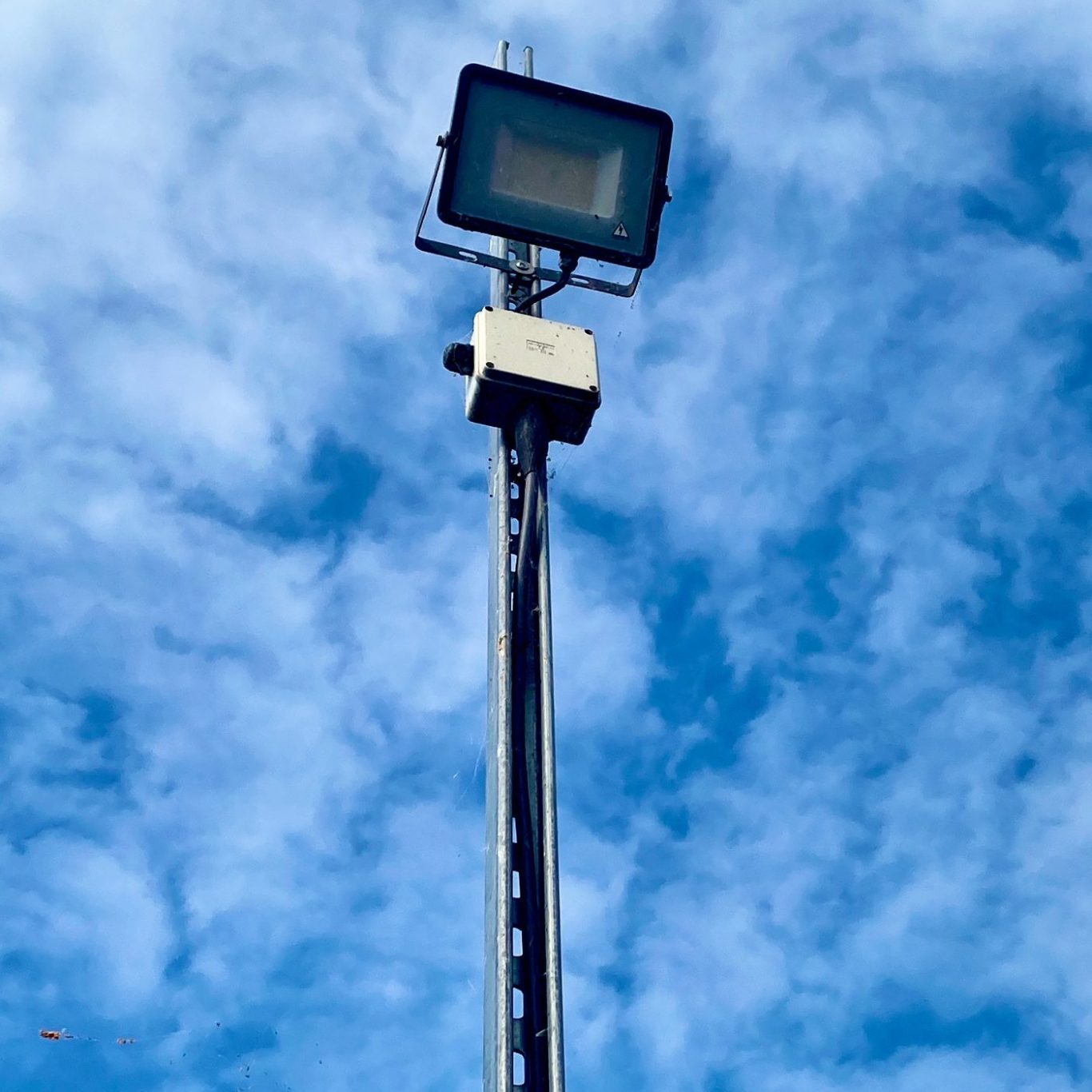 Light on a post on storage facility