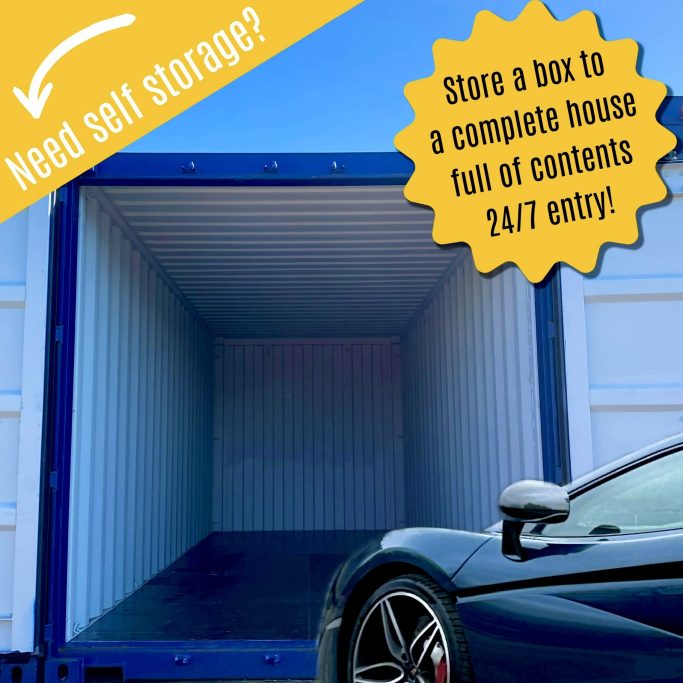 Empty storage container with a parked car, promoting 24/7 access for self-storage.