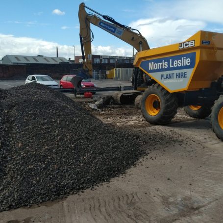 dumper truck in a yard