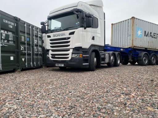 large HGV lorry delivering a shipping  container at Carlisle