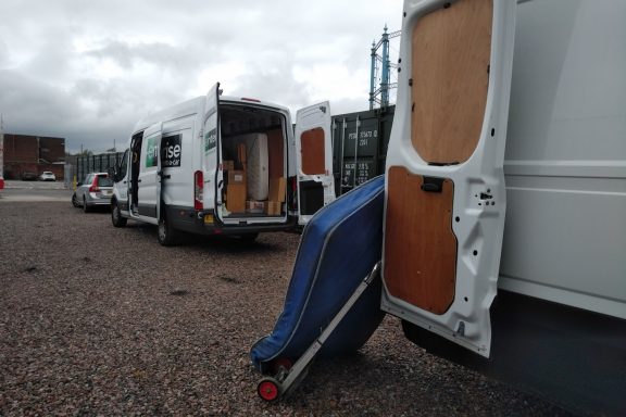 vans unloading into storage units