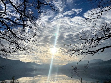 winter mountain view in cumbria with sun shining