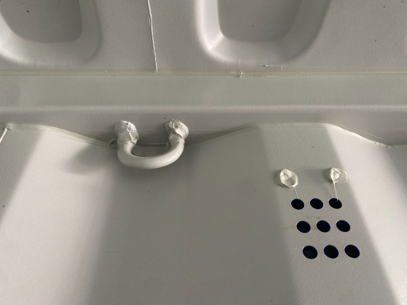 vent holes and cargo tie points inside a shipping container