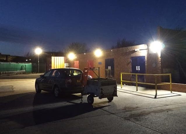 self storage depot at night time with lights on