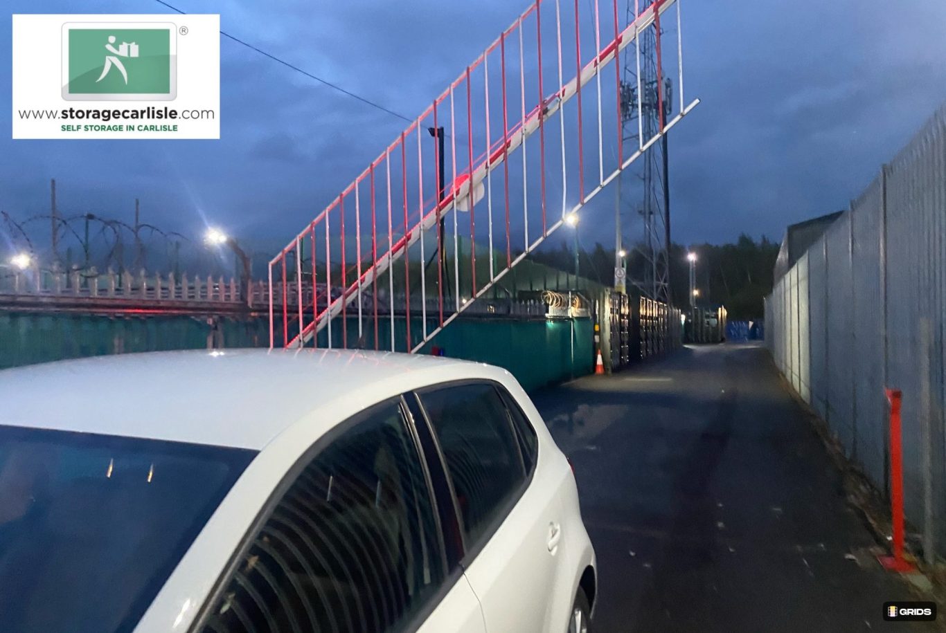 security barrier letting a vehicle onto a self storage facility