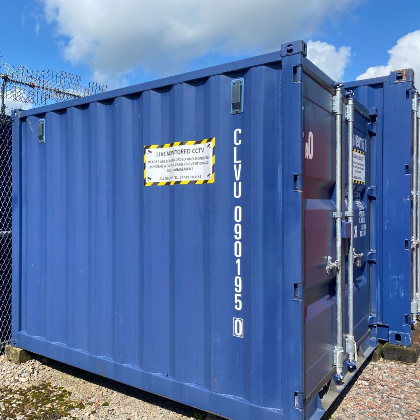 side view of an 8 foot ISO shipping container next to a 10 foot ISO shipping container