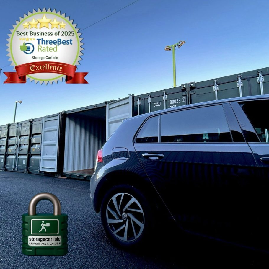 a motorcar parked beside a row of self storage shipping containers. One container has the door open showing its interior.