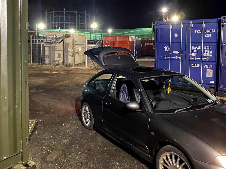 car unloading at night time on storage site