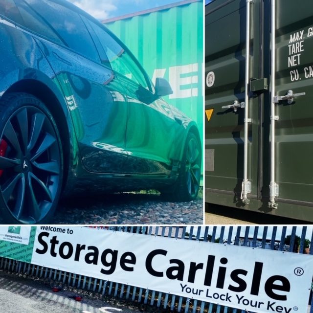 a tesla car parked next to a shipping container