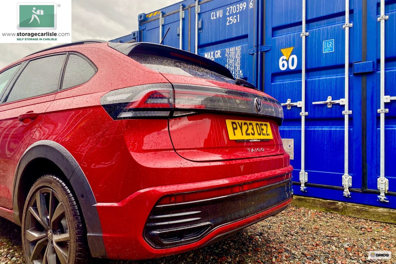 a car about to unload on a storage facility