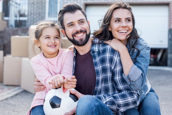 happy family moving into their new home